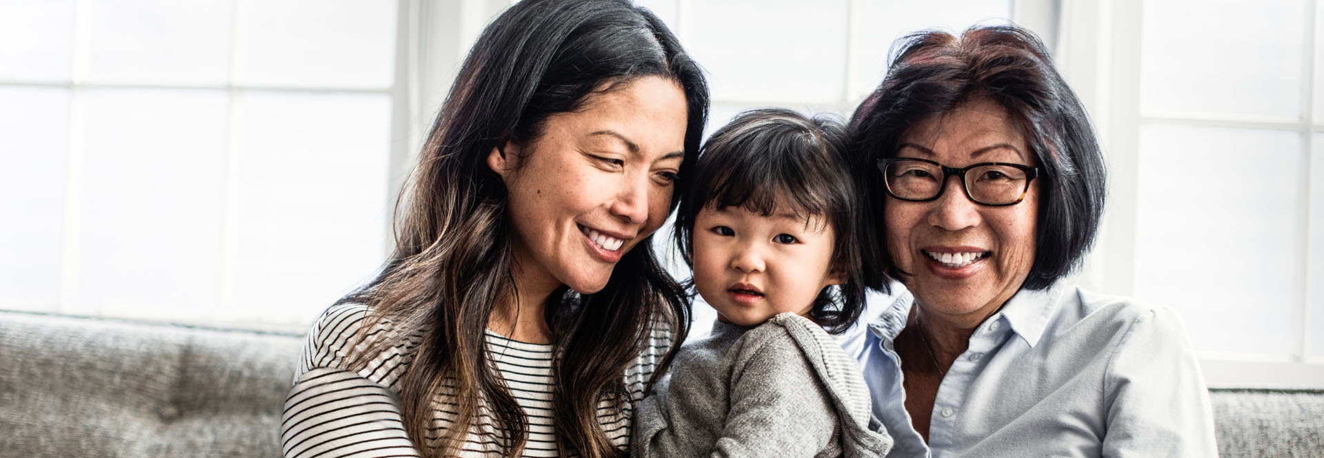 Portrait of three generations of an Asian-American family